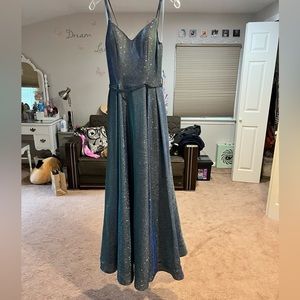 Bought from prom girl, variety of sparkly blues. Dress has pockets